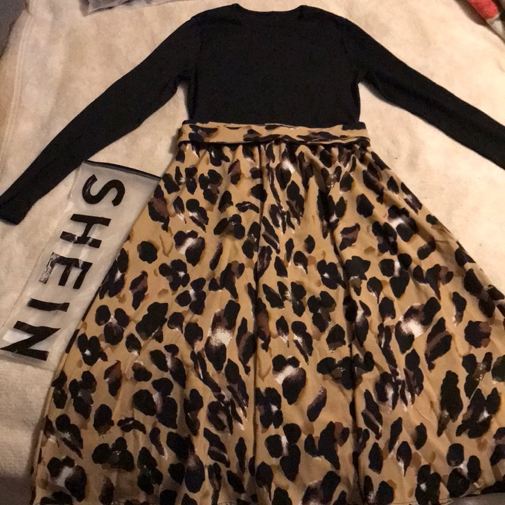 Knee length dress.